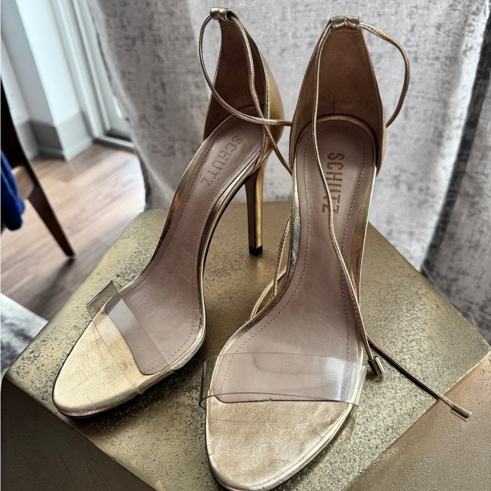 SCHUTZ Gold Stiletto Heels with Transparent Accents